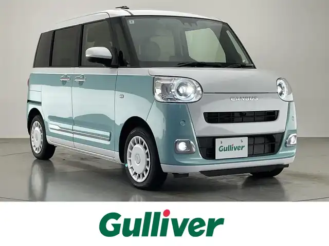 ダイハツ ムーヴ キャンバス ストライプス G 愛知県 2024(令6)年 0.3万km シャイニングホワイトパール/ファインミントメタリック 純正ナビ　全方位カメラ　禁煙車　フルセグＴＶ　Ｂｌｕｅｔｏｏｔｈ　シートヒーター　ドリンクホルダーヒーター　両側パワスラ　スマアシIII　衝突軽減装置　コーナーセンサー　ＬＥＤオートライト　電動パーキング　