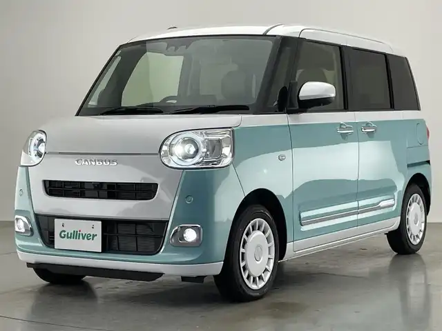 ダイハツ ムーヴ キャンバス ストライプス G 愛知県 2024(令6)年 0.3万km シャイニングホワイトパール/ファインミントメタリック 純正ナビ　全方位カメラ　禁煙車　フルセグＴＶ　Ｂｌｕｅｔｏｏｔｈ　シートヒーター　ドリンクホルダーヒーター　両側パワスラ　スマアシIII　衝突軽減装置　コーナーセンサー　ＬＥＤオートライト　電動パーキング　