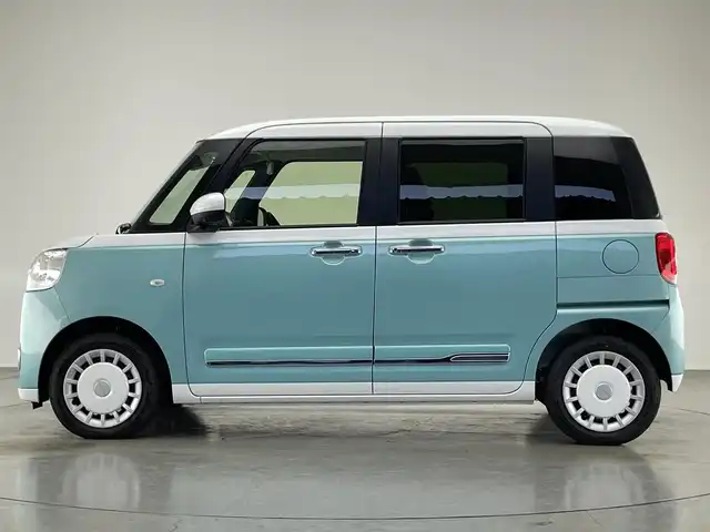 ダイハツ ムーヴ キャンバス ストライプス G 愛知県 2024(令6)年 0.3万km シャイニングホワイトパール/ファインミントメタリック 純正ナビ　全方位カメラ　禁煙車　フルセグＴＶ　Ｂｌｕｅｔｏｏｔｈ　シートヒーター　ドリンクホルダーヒーター　両側パワスラ　スマアシIII　衝突軽減装置　コーナーセンサー　ＬＥＤオートライト　電動パーキング　