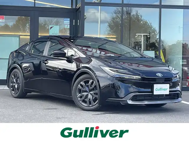 トヨタ プリウス G 栃木県 2024(令6)年 1.8万km アティチュードブラックマイカ トヨタセーフティセンス/純正8インチディスプレイオーディオ(ナビ付)/フルセグTV/Bluetooth/USB/HDMI/MiraCast/バックカメラ/ビルトインETC2.0/前後ドライブレコーダー/TVキャンセラー/シートヒーター/レーダークルーズコントロール/ブラインドスポットモニター/クリアランスソナー/ステアリングリモコン/ダウンサス(純正積込)/純正17インチWCP/アクセサリーコンセント/スマートキー/スペアキー/保証書/取説