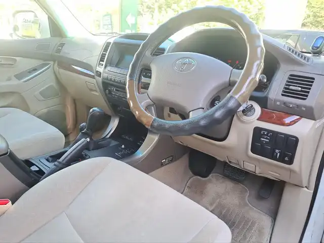 トヨタ ランドクルーザー プラド TZ 大阪府 2003(平15)年 10.9万km ホワイトパールクリスタルシャイン /４WD//純正DVDマルチナビ//トランスファー//HEIGHT COMTOROL//クルーズコントロール//社外ETC//バックカメラ//純正17インチアルミホイール//フロントセンサー//オートライト//Wエアバッグ//ABS//キーレス//取扱説明書有//スペアキー有