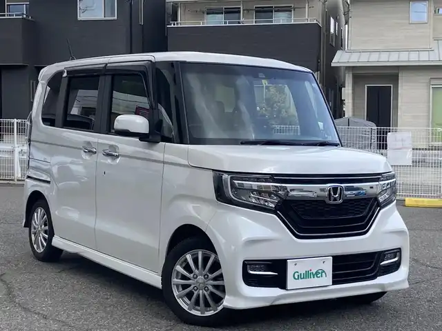 ホンダ Ｎ ＢＯＸ カスタム G EX ターボ ホンダセンシング 兵庫県 2020(令2)年 5.7万km プラチナホワイトパール ワンオーナー/純正8インチメモリーナビ/フルセグTV/CD/DVD/Bluetooth/SD/FM/AM/バックカメラ/ビルトインETC/前後ドライブレコーダー/衝突軽減ブレーキ/車線維持支援システム/アダプティブクルーズコントロール/先行車発進告知/パドルシフト/両側パワースライドドア/プッシュスタート/LEDヘッドライト/フォグランプ/オートライト/D/N シートヒーター/ステアリングスイッチ/リア コーナーセンサー/革巻きステアリング/電格ミラー/ISOFIX/フロアマット/ドアバイザー/アイドリングストップ/横滑り防止装置/スペアキー1本/新車時保証書/取扱説明書