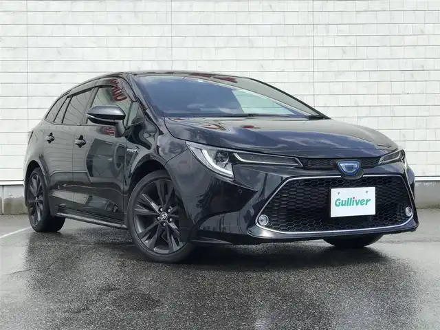 トヨタ カローラツーリング ハイブリッド ダブルバイビー 富山県 2020(令2)年 4.9万km ブラックマイカ 〇純正OP9インチディスプレイオーディオ	/〇フルセグTV	/〇バックモニター	/〇セーフティセンス	/〇プリクラッシュセーフティ/〇レーントレーシングアシスト/〇全車速追従機能付レーダークルーズコントロール/〇オートマチックハイビーム/〇ロードサインアシスト/〇インテリジェントクリアランスソナー/〇丸型一灯式LEDヘッドランプ	/〇LEDデイライト/〇メッキ加飾付LEDフロントフォグランプ/〇リアスポイラー/〇純正17インチアルミ/〇スモークシルバー加飾付き革巻きステアリングホイール/〇オプティロンメーター/〇７インチカラーマルチインフォメーションディスプレイ	/〇オートエアコン			/〇ブラック合皮/ブラウンステッチ入レザテックコンビスポーティシート/シートバックポケット	/〇スマートエントリー/〇スタートシステム/〇充電用USB端子	/〇禁煙車