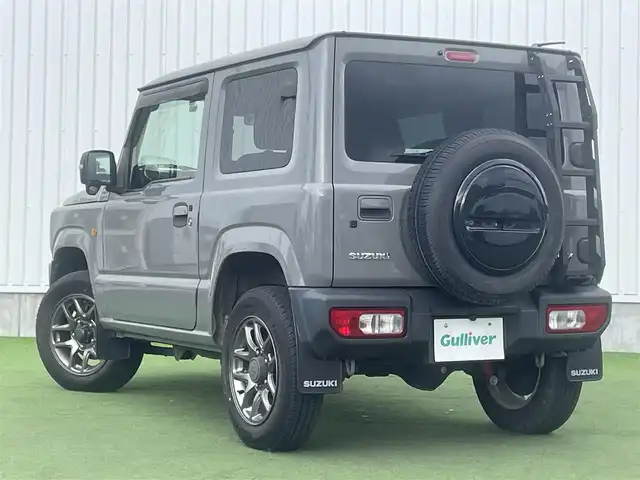 スズキ ジムニー XC 香川県 2019(平31)年 3.9万km ミディアムグレー 社外ＳＤナビ/→フルセグＴＶ/バックカメラ/Bluetooth/CD/社外ショックアムソーバー/社外リアラダー/クルーズコントロール/レーンキープアシスト/衝突軽減システム/横滑り防止機能/ダウンヒルアシストコントロール/アイドリングストップ/パワーステアリング/パワーウィンドウ/エアバック→Ｗ＋サイド/カーテンエアバック/オートエアコン/ETC/シートヒーター/純正ＬＥＤライト/純正アルミホイール/純正フロアマット　/社外ミュージックサーバー（ＳＤなし）　/盗難防止車/プッシュスタート/スマートキー/オートマチックハイビーム/オートライト/アシストミラー/スペアキー1本/背面タイヤ