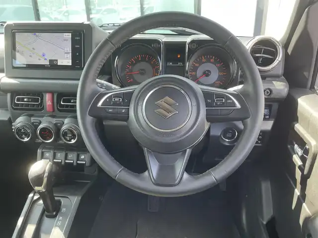 スズキ ジムニー XC 香川県 2019(平31)年 3.9万km ミディアムグレー 社外ＳＤナビ/→フルセグＴＶ/バックカメラ/Bluetooth/CD/社外ショックアムソーバー/社外リアラダー/クルーズコントロール/レーンキープアシスト/衝突軽減システム/横滑り防止機能/ダウンヒルアシストコントロール/アイドリングストップ/パワーステアリング/パワーウィンドウ/エアバック→Ｗ＋サイド/カーテンエアバック/オートエアコン/ETC/シートヒーター/純正ＬＥＤライト/純正アルミホイール/純正フロアマット　/社外ミュージックサーバー（ＳＤなし）　/盗難防止車/プッシュスタート/スマートキー/オートマチックハイビーム/オートライト/アシストミラー/スペアキー1本/背面タイヤ