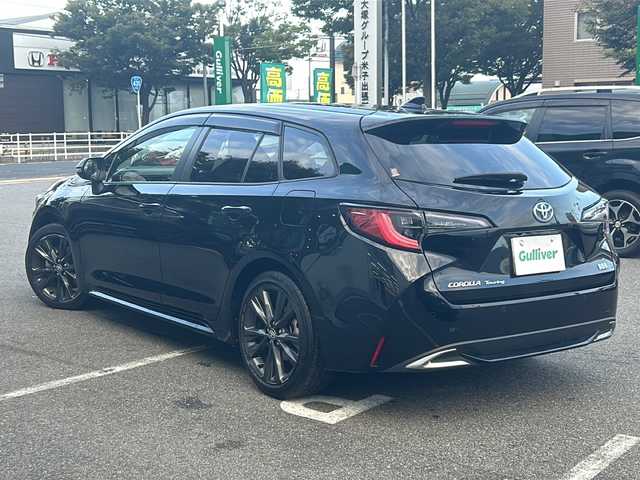 トヨタ カローラツーリング ハイブリッド ダブルバイビー 鳥取県 2023(令5)年 2.4万km アティチュードブラックマイカ ワンオーナー/9インチディスプレイオーディオ/TOYOTAｃｏｎｎｅｃｔ/メモリナビ/フルセグＴＶ/バックカメラ/Ｂｌｕｅｔｏｏｔｈ　ＵＳＢ/Toyota Safety Sense/全車速追従機能付レーダークルーズコントロール/レーンキープアラート/コーナーセンサー/オートホールド/パーキングサポートブレーキ/スペアキー/ＥＴＣ２．０/レザテックシート/リヤスポイラー/１７インチＡＷ/オートハイビーム/Bi-Beam LEDヘッドランプ/バイビームLEDヘッドランプ/LEDクリアランスランプ/LEDフロントフォグランプ/フロアマット/ドアバイザー/ライトレベライザー/新車保証書/取扱説明書