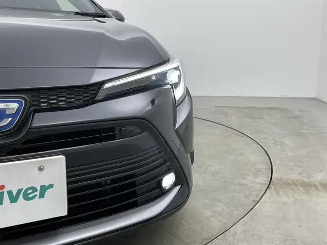 トヨタ カローラツーリング ハイブリッド ダブルバイビー 岡山県 2023(令5)年 2.5万km アティチュードブラックマイカ 純正10.5インチディスプレイオーディオ/【ナビ/Bluetooth/フルセグTV/Carplay/USB接続】/バックカメラ/100V電源/ビルトインETC2.0/LEDヘッドライト/オートハイビーム/オートライト/フォグランプ/オートブレーキホールド/ブラインドスポットモニター/レーダークルーズコントロール/ハーフレザーシート/純正17インチアルミホイール/ドアバイザー/プッシュスタート/スマートキー×2