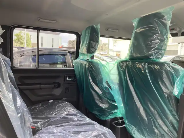 スズキ ジムニー ノマド FC 福岡県 2025(令7)年 0.1千km 黒 登録時走行100キロ未満/ワンオーナー/レーダークルーズコントロール/前席シートヒーター/パートタイム４WD /衝突軽減ブレーキ/コーナーセンサー/プッシュスタート/ウインカーミラー/アイドリングストップ/ステアリングスイッチ/純正15インチアルミホイール/スペアキー×1/取扱説明書/保証書