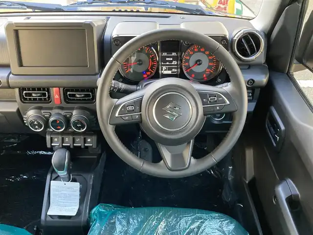 スズキ ジムニー ノマド FC 福岡県 2025(令7)年 0.1千km 黒 登録時走行100キロ未満/ワンオーナー/レーダークルーズコントロール/前席シートヒーター/パートタイム４WD /衝突軽減ブレーキ/コーナーセンサー/プッシュスタート/ウインカーミラー/アイドリングストップ/ステアリングスイッチ/純正15インチアルミホイール/スペアキー×1/取扱説明書/保証書