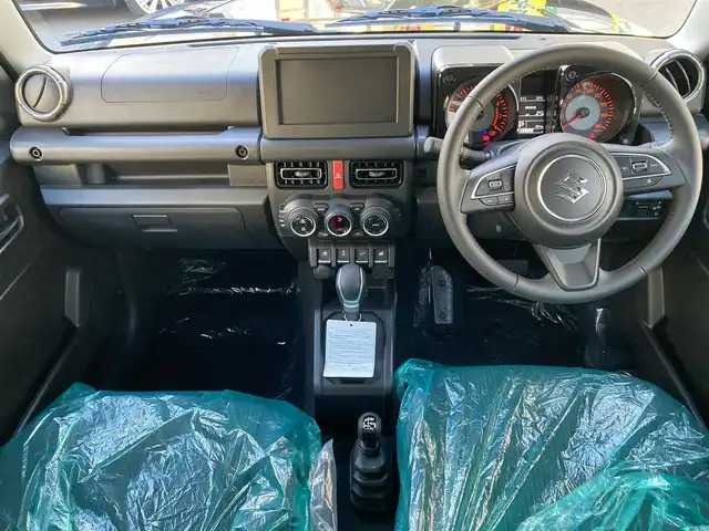 スズキ ジムニー ノマド FC 福岡県 2025(令7)年 0.1千km 黒 登録時走行100キロ未満/ワンオーナー/レーダークルーズコントロール/前席シートヒーター/パートタイム４WD /衝突軽減ブレーキ/コーナーセンサー/プッシュスタート/ウインカーミラー/アイドリングストップ/ステアリングスイッチ/純正15インチアルミホイール/スペアキー×1/取扱説明書/保証書