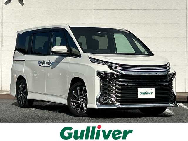 トヨタ ヴォクシー ハイブリッド S－Z 千葉県 2023(令5)年 2.3万km ホワイトパールクリスタルシャイン 純正ナビ　全方位カメラ　前後ドラレコ　両側パワースライドドア　パワーバックドア　追従式クルコン　オットマン　シートヒーター　純正フロアマット　ＥＴＣ２．０　ナノイーＸ　ＬＥＤヘッドライト　純正ＡＷ