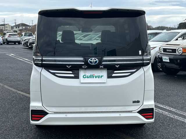 トヨタ ヴォクシー ハイブリッド S－Z 千葉県 2023(令5)年 2.3万km ホワイトパールクリスタルシャイン 純正ナビ　全方位カメラ　前後ドラレコ　両側パワースライドドア　パワーバックドア　追従式クルコン　オットマン　シートヒーター　純正フロアマット　ＥＴＣ２．０　ナノイーＸ　ＬＥＤヘッドライト　純正ＡＷ