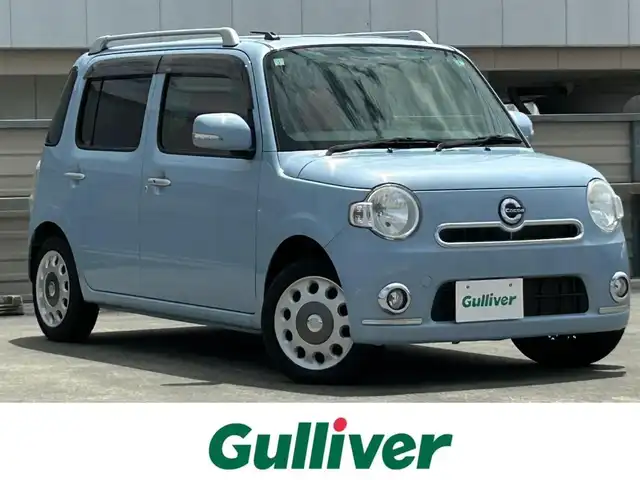 ダイハツ ミラ ココア プラスX 静岡県 2013(平25)年 2.8万km ミストブルーマイカメタリック 取扱説明書/保証書/KENWOOD7型メモリナビ/フルセグTV/BTオーディオ/DVD再生/スマートキー/AAC/純正フロアマット/パワーステアリング/パワーウィンドウ/ベンチシート/アームレスト/ルーフレール/赤色シートカバー