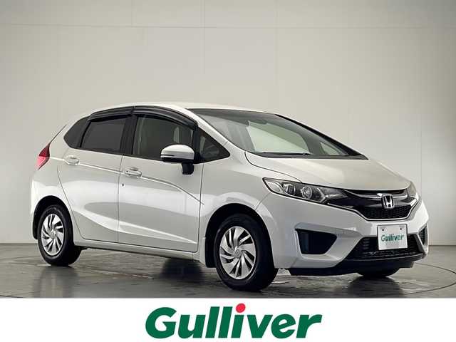 ホンダ フィット 13G Lパッケージ 宮崎県 2015(平27)年 8.3万km プレミアムホワイトパールⅡ 禁煙車/純正メモリーナビ　VXM-165VFi/（フルセグTV/CD/DVD/Bluetooth）/バックカメラ/シティブレーキアシストCTBA/クルーズコントロール/ステアリングスイッチ/純正フロアマット/純正LEDオートライト/電動格納ミラー/スマートキー/プッシュスタート/ETC/12V電源