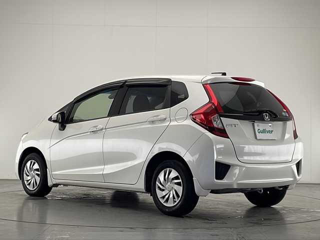 ホンダ フィット 13G Lパッケージ 宮崎県 2015(平27)年 8.3万km プレミアムホワイトパールⅡ 禁煙車/純正メモリーナビ　VXM-165VFi/（フルセグTV/CD/DVD/Bluetooth）/バックカメラ/シティブレーキアシストCTBA/クルーズコントロール/ステアリングスイッチ/純正フロアマット/純正LEDオートライト/電動格納ミラー/スマートキー/プッシュスタート/ETC/12V電源