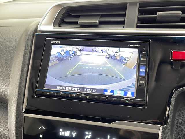 ホンダ フィット 13G Lパッケージ 宮崎県 2015(平27)年 8.3万km プレミアムホワイトパールⅡ 禁煙車/純正メモリーナビ　VXM-165VFi/（フルセグTV/CD/DVD/Bluetooth）/バックカメラ/シティブレーキアシストCTBA/クルーズコントロール/ステアリングスイッチ/純正フロアマット/純正LEDオートライト/電動格納ミラー/スマートキー/プッシュスタート/ETC/12V電源