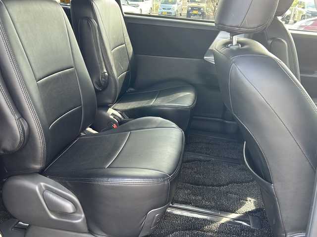 トヨタ ヴォクシー ZS 煌 茨城県 2010(平22)年 7.8万km ブラック 社外SDナビ/　　BT/CD/ワンセグ/バックカメラ/社外フリップダウンモニター/パドルシフト/両側パワースライドドア/純正16インチアルミホイール/革巻きステアリング/レザー調シートカバー/HIDオートライト/スマートキー/ETC