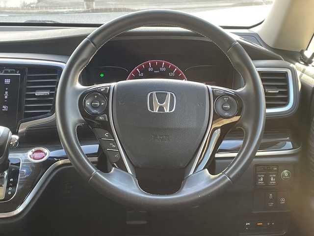 ホンダ オデッセイ アブソルート 沖縄県 2015(平27)年 11.7万km クリスタルブラックパール 純正ナビ　/CD/DVD/BT/フルセグ/フリップダウンモニター　/バックカメラ　/両側パワースライドドア　/クルーズコントロール　/ＬＥＤヘッドライト　/ハーフレザーシート　/社外アルミホイール/ステアリングスイッチ/アイドリングストップ/デジタルインナーミラー/電動格納ミラー/オートライト/スマートキー/ETC