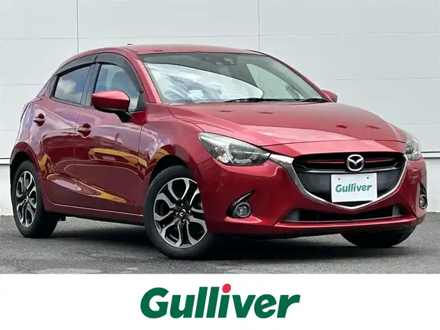 マツダ デミオ XD ツーリング Lパッケージ 佐賀県 2015(平27)年 7.7万km ソウルレッドプレミアムメタリック 純正SDナビ/・バックカメラ/CD/DVD/フルセグ/セーフティパッケージ/・ブラインドスポットモニター/・リアクロストラフィックアラート/・ハイビームアシスト/・車線逸脱警報/シティーブレーキサポート/AT誤発進抑制機能/LEDオートヘッドライト/アクティブドライビングディスプレイ/ハーフレザーシート/パドルシフト/スマートキー/ETC