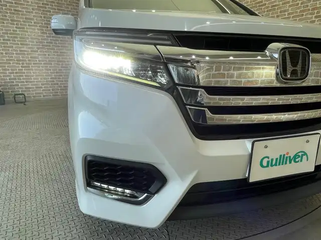 ホンダ ステップワゴン スパーダ ハイブリッド G ホンダセンシング 岩手県 2019(平31)年 7.7万km プラチナホワイトパール 両側パワースライドドア/ホンダセンシング　/クルーズコントロール/レーンアシスト/バックカメラ/ETC/純正ナビ（Bluetooth CD DVD USB フルセグ）/LEDヘッドライト/アイドリングストップ/オートエアコン/オートライト/フォグランプ/ステアリングスイッチ/純正１６インチアルミホイール/ドアミラーウインカー/３列シート/ロールサンシェード/ウォークスルー/わくわくゲート
