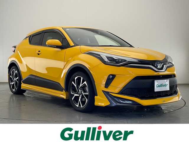 トヨタ Ｃ－ＨＲ G 宮崎県 2021(令3)年 7.3万km イエロー 禁煙車/トヨタセーフティセンス/純正8型ディスプレイオーディオ/（T-CONNECT/Bluetooth/FMAM）/純正バックカメラ/純正モデリスタエアロ/純正ビルトインETC/純正18インチアルミ/純正LEDオートライト/純正LEDフォグ/純正フロアマット/社外前後ドライブレコーダー/全方位モニター/アダプティブクルーズコントロール/レーンディパーチャーアラート/オートマチックハイビーム/クリアランスソナー/ブラインドスポットモニター/電子パーキング/オートホールド/本革巻ハンドル/デュアルオートエアコン（ナノイー）/前席シートヒーター/ハーフレザーシート/ウインカードアミラー/オート電動格納ミラー/スマートキー/プッシュエンジンスタート/スペアキー/新車時保証書/取扱い説明書