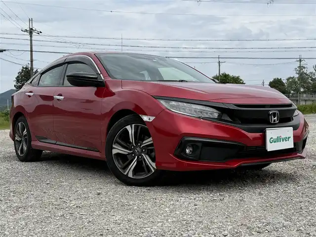 ホンダ シビック セダン 兵庫県 2020(令2)年 4.1万km プレミアムクリスタルレッドM ワンオーナー/純正ナビ/フルセグTV/バックモニター/純正ドラレコ（F/R）/ETC2.0/黒革半シート/両前席パワーシート＆シートヒーター/パドルシフト/レーダークルーズ/レーンキープ/LEDヘッドライト/プッシュスタート＆スマートキー