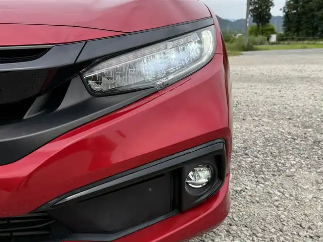 ホンダ シビック セダン 兵庫県 2020(令2)年 4.1万km プレミアムクリスタルレッドM ワンオーナー/純正ナビ/フルセグTV/バックモニター/純正ドラレコ（F/R）/ETC2.0/黒革半シート/両前席パワーシート＆シートヒーター/パドルシフト/レーダークルーズ/レーンキープ/LEDヘッドライト/プッシュスタート＆スマートキー
