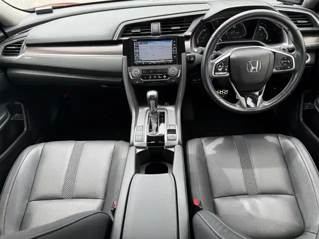 ホンダ シビック セダン 兵庫県 2020(令2)年 4.1万km プレミアムクリスタルレッドM ワンオーナー/純正ナビ/フルセグTV/バックモニター/純正ドラレコ（F/R）/ETC2.0/黒革半シート/両前席パワーシート＆シートヒーター/パドルシフト/レーダークルーズ/レーンキープ/LEDヘッドライト/プッシュスタート＆スマートキー