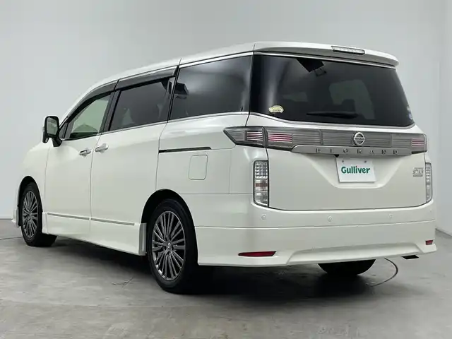 日産 エルグランド 250HWS S アーバンクロム 三重県 2020(令2)年 3.8万km ブリリアントホワイトパール 禁煙車/純正９インチＳＤナビ　/バックカメラ/WAC/MTモード付きAT/ウッドコンビステアリング/ハーフレザーシート/社外サス/両側パワースライドドア　　/純正１１インチフリップダウンモニター　/エマージェンシーブレーキ　/レーダークルーズコントロール　/オートハイビーム/オートライト /フォグ　/ビルトインＥＴＣ２．０　/ＬＥＤ