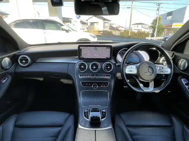 メルセデス・ベンツ Ｃ２２０ｄ アバンギャルド　AMGライン 熊本県 2019(令1)年 8.4万km ポーラホワイト ブルメスターサウンド/純正ナビ/【フルセグTV/Bluetooth/AppleCarPlay】/バックカメラ/イロットディストロニック（追従型クルコン）/パドルシフト/トラクションコントロール/AIR BODY CONTROLサスペンション/ヘッドアップディスプレイ/ブラインドスポットモニター/パーキングアシスト/電動チルト/黒革シート/パワーシート/シートヒーター/ステアリングヒーター/純正AMG18インチAW/ETC2.0/前後ドライブレコーダー/純正パフュームアトマイザー/コーナーセンサー/アイドリングストップ