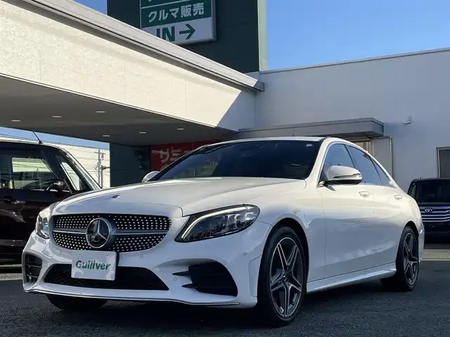 メルセデス・ベンツ Ｃ２２０ｄ アバンギャルド　AMGライン 熊本県 2019(令1)年 8.4万km ポーラホワイト ブルメスターサウンド/純正ナビ/【フルセグTV/Bluetooth/AppleCarPlay】/バックカメラ/イロットディストロニック（追従型クルコン）/パドルシフト/トラクションコントロール/AIR BODY CONTROLサスペンション/ヘッドアップディスプレイ/ブラインドスポットモニター/パーキングアシスト/電動チルト/黒革シート/パワーシート/シートヒーター/ステアリングヒーター/純正AMG18インチAW/ETC2.0/前後ドライブレコーダー/純正パフュームアトマイザー/コーナーセンサー/アイドリングストップ