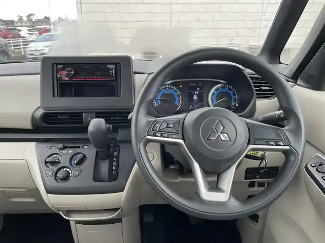 三菱 ｅＫスペース M 石川県 2022(令4)年 4.5万km 黒 4WD/社外オーディオ/シートヒーター/両側スライドドア/キーレス/レーダーブレーキ/コーナーセンサー/オートライト/レーンキープアシスト/電動ミラー/アイドリングストップ