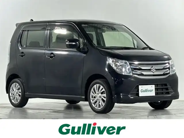 スズキ ワゴンＲ FZ 佐賀県 2015(平27)年 0.7万km ブルーイッシュブラックパール3 社外7インチナビ/ワンセグTV/CD/DVD/Bluetooth/衝突被害軽減システム/ハロゲンヘッドライト/横滑り防止装置/アイドリングストップ/ヘッドライトレベライザー/運転席シートヒーター/純正フロアマット/純正14インチアルミホイール/ステアリングリモコン/ドアバイザー/電動格納ミラー/スマートキー/スペアキー×１/プッシュスタート