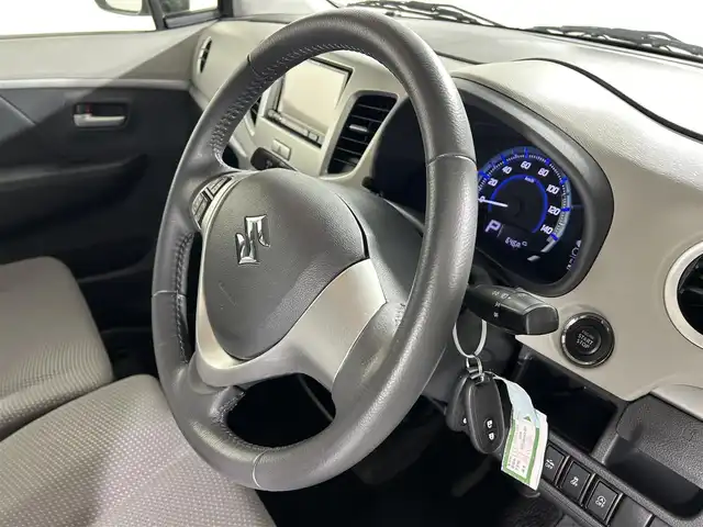 スズキ ワゴンＲ FZ 佐賀県 2015(平27)年 0.7万km ブルーイッシュブラックパール3 社外7インチナビ/ワンセグTV/CD/DVD/Bluetooth/衝突被害軽減システム/ハロゲンヘッドライト/横滑り防止装置/アイドリングストップ/ヘッドライトレベライザー/運転席シートヒーター/純正フロアマット/純正14インチアルミホイール/ステアリングリモコン/ドアバイザー/電動格納ミラー/スマートキー/スペアキー×１/プッシュスタート