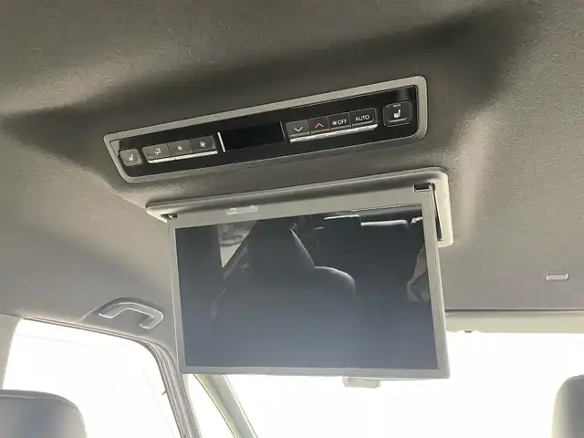 トヨタ ヴォクシー ハイブリッド S－Z 大分県 2023(令5)年 4.5万km アティチュードブラックマイカ 純正ディスプレイオーディオ/CD/DVD/BT/フルセグTV（キャンセラー付き）/純正フリップダウンモニター/ETC2.0 /快適利便パッケージHigh/・ハンズフリースライドドア/・パワーバックドア/・全席シートヒーター/・ステアリングヒーター/・オットマン/電動パーキング/オートブレーキホールド/両側パワースライドドア/トヨタセーフティセンス/ブラインドスポットモニター/クリアランスソナー/ステアリングヒーター/オートハイビーム/LEDヘッドライト/ドライブレコーダー