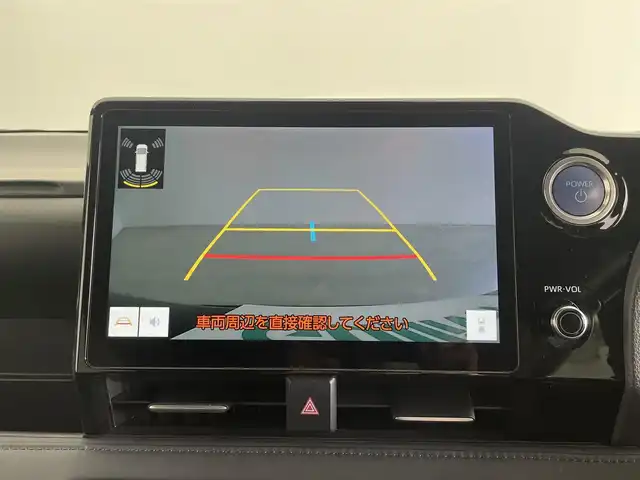 トヨタ ヴォクシー ハイブリッド S－Z 大分県 2023(令5)年 4.5万km アティチュードブラックマイカ 純正ディスプレイオーディオ/CD/DVD/BT/フルセグTV（キャンセラー付き）/純正フリップダウンモニター/ETC2.0 /快適利便パッケージHigh/・ハンズフリースライドドア/・パワーバックドア/・全席シートヒーター/・ステアリングヒーター/・オットマン/電動パーキング/オートブレーキホールド/両側パワースライドドア/トヨタセーフティセンス/ブラインドスポットモニター/クリアランスソナー/ステアリングヒーター/オートハイビーム/LEDヘッドライト/ドライブレコーダー