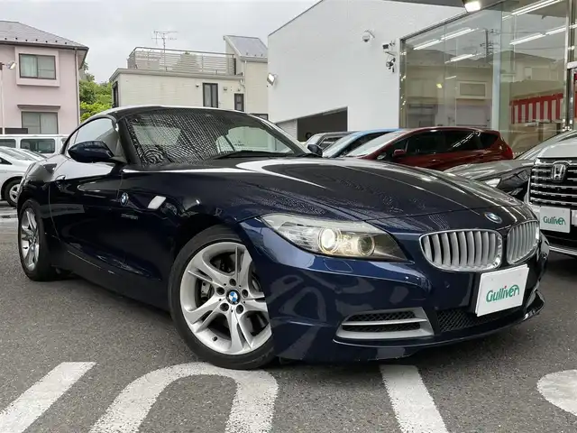 ＢＭＷ Ｚ４ sDrive35i 神奈川県 2010(平22)年 12.5万km ディープシーブルー 登録時走行距離124826km/純正ナビ/　【CD/DVD/ワンセグTV】/横滑り防止/レザーシート/シートヒーター/ビルトインETC/純正HIDライト/ヘッドライトレベライザー/スマートキー/プッシュスタート/純正アルミホイール 17インチ/リアプライバシーガラス/新車時整備手帳（保証書）/取扱説明書