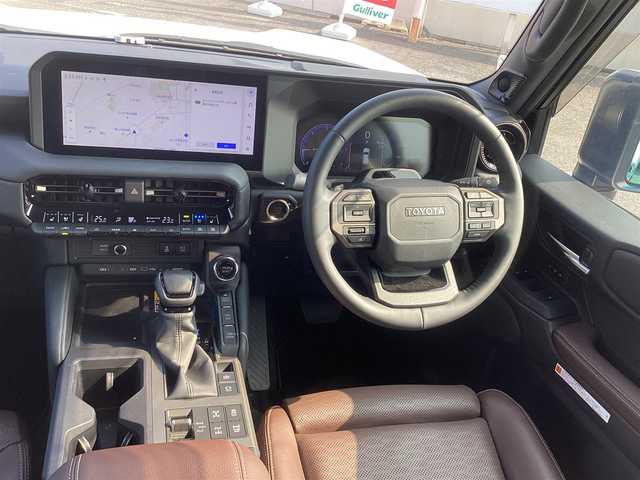 トヨタ ランドクルーザー ２５０ ZX 千葉県 2024(令6)年 0.3万km パール 純正ナビゲーション/bluetooth/TV/マルチテレインモニター/12.3インチディスプレイオーディオプラス/JBLプレミアムサウンドシステム/opヒッチメンバー/ベンチレーション機能つき快適温熱シート/D/N2列目シート/トヨタチームメイト/ETC2.0