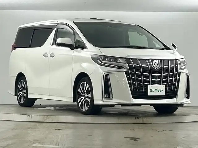 トヨタ アルファード S Cパッケージ 愛知県 2022(令4)年 2.8万km ホワイトパールクリスタルシャイン 禁煙車/純正10インチナビ/（ＤＶＤ/Bluetooth/ＡＭ/ＦＭ/USB）/バックカメラ/Ｗサンルーフ/純正フリップダウンモニター/AC100V電源/トヨタセーフティセンス/・プリクラッシュセーフティ/・レーンディパーチャーアラート/・レーダークルーズコントロール/・オートマチックハイビーム/・ブラインドスポットモニター/コーナーセンサー/デジタルインナーミラー/ドライブレコーダー/ETC/ステアリングヒーター/オットマン/シートヒーター/シートベンチレーション/パワーシート/メモリシート/両側パワースライドドア/パワーバックドア/純正18インチアルミホイール/LEDヘッドライト/フロントフォグランプ/オートライト/純正フロアマット/スマートキー/プッシュスタート/スペアキー有