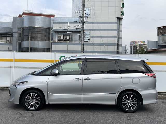 トヨタ エスティマ ハイブリッド アエラス プレミアム G 岩手県 2016(平28)年 6.8万km シルバーM /4WD//純正9インチメモリナビ//AM/FM/CD/DVD/SD/BT/フルセグTV//バックカメラ/サイドカメラ//ビルトインETC//純正ドライブレコーダー//両側パワースライドドア//茶ハーフレザーシート//前席シートヒーター//運転席パワーシート//二列目オットマン//PCS/LDA/クリソナ/先行車発進お知らせ//パワーバックドア//クルーズコントロール//AC100V/12V120W//プッシュスタート//木目調+革巻きステアリング//木目調+革巻きシフト//ステアリングスイッチ//オートLEDライト//オートハイビーム//防眩ミラー//オートリトラクタブルウィンカーミラー//フロアマット/純正ドアバイザー//スペアキー有//取扱説明書/保証書/ナビ取説//記録簿H28-R4 R7-R7