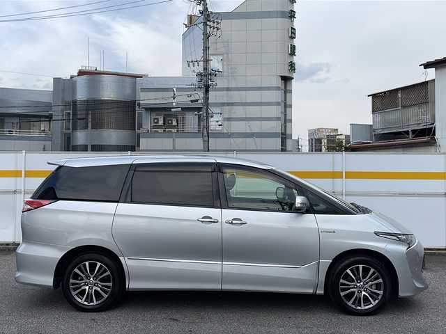 トヨタ エスティマ ハイブリッド アエラス プレミアム G 岩手県 2016(平28)年 6.8万km シルバーM /4WD//純正9インチメモリナビ//AM/FM/CD/DVD/SD/BT/フルセグTV//バックカメラ/サイドカメラ//ビルトインETC//純正ドライブレコーダー//両側パワースライドドア//茶ハーフレザーシート//前席シートヒーター//運転席パワーシート//二列目オットマン//PCS/LDA/クリソナ/先行車発進お知らせ//パワーバックドア//クルーズコントロール//AC100V/12V120W//プッシュスタート//木目調+革巻きステアリング//木目調+革巻きシフト//ステアリングスイッチ//オートLEDライト//オートハイビーム//防眩ミラー//オートリトラクタブルウィンカーミラー//フロアマット/純正ドアバイザー//スペアキー有//取扱説明書/保証書/ナビ取説//記録簿H28-R4 R7-R7
