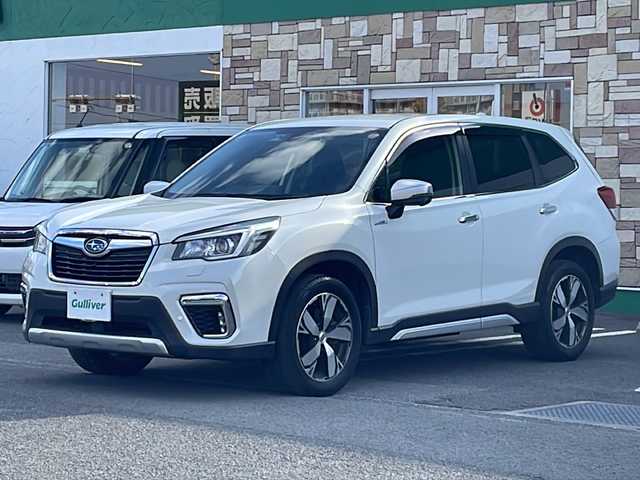スバル フォレスター ハイブリッド アドバンス 徳島県 2020(令2)年 6.8万km クリスタルホワイトP 社外メモリナビ/（CD/USB/BT/フルセグ/ラジオ）/バックカメラ/追従式クルーズコントロール/ブラインドスポットモニター/パドルシフト/アイサイト/純正18インチAW/自動パーキングブレーキ/純正ドアバイザー/ステアリングヒーター/前席シートヒーター/前席パワーシート/ドライブレコーダー