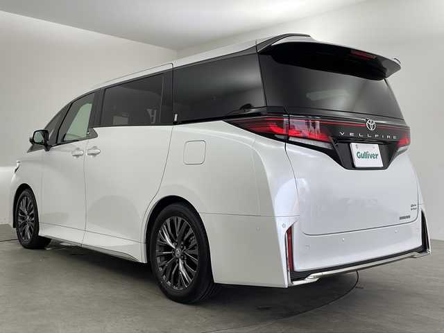 トヨタ ヴェルファイア ハイブリット Z プレミア 兵庫県 2024(令6)年 1.3万km プラチナホワイトパールマイカ ・純正14インチディスプレイオーディオplus/・フルセグ/・純正13.2インチフリップダウンモニター/・パノラミックビューモニター/・デジタルインナーミラー/・左右独立ムーンルーフ/・両側パワースライドドア/・パワーバックドア/・ユニバーサルステップ/・アドバンストパーク/・トヨタセーフティセンス/・プリクラッシュセーフティ/・レーンチェンジアシスト/・レーントレーシングアシスト/・レーンディパチャーアラート/・レーダークルーズコントロール/・アダプティブハイビームアシスト/・ブラインドスポットモニター/・快適温熱シート/・エアシート/・エグゼクティブパワーシート/・AC100V電源/・置くだけ充電/・スマートキー/・前後ドライブレコーダー/・LEDライト/・LEDフォグ
