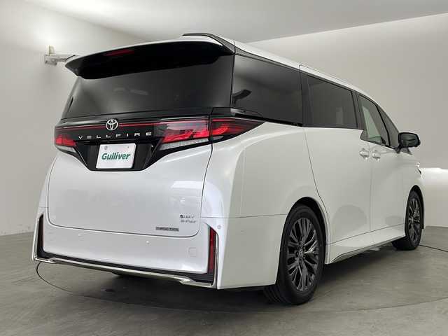 トヨタ ヴェルファイア ハイブリット Z プレミア 兵庫県 2024(令6)年 1.3万km プラチナホワイトパールマイカ ・純正14インチディスプレイオーディオplus/・フルセグ/・純正13.2インチフリップダウンモニター/・パノラミックビューモニター/・デジタルインナーミラー/・左右独立ムーンルーフ/・両側パワースライドドア/・パワーバックドア/・ユニバーサルステップ/・アドバンストパーク/・トヨタセーフティセンス/・プリクラッシュセーフティ/・レーンチェンジアシスト/・レーントレーシングアシスト/・レーンディパチャーアラート/・レーダークルーズコントロール/・アダプティブハイビームアシスト/・ブラインドスポットモニター/・快適温熱シート/・エアシート/・エグゼクティブパワーシート/・AC100V電源/・置くだけ充電/・スマートキー/・前後ドライブレコーダー/・LEDライト/・LEDフォグ