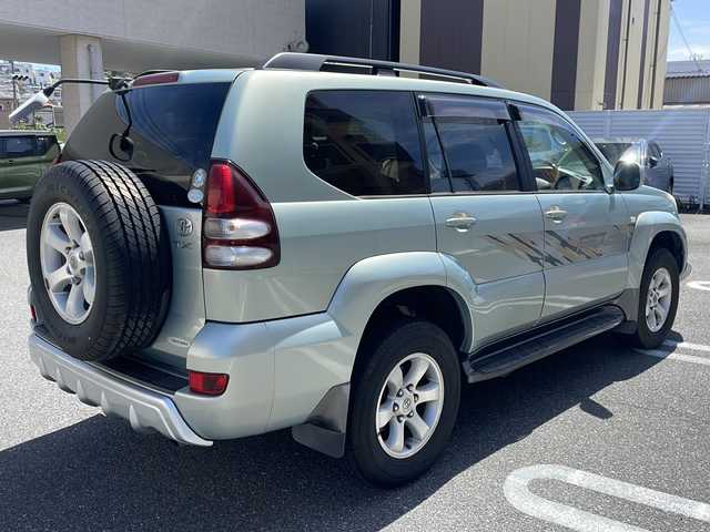 トヨタ ランドクルーザー プラド TX 広島県 2004(平16)年 6.6万km ライトブルー /登録時走行距離/　　　　　　　65207キロ/ワンオーナー/4WD/サンルーフ/純正ナビ/スペアキー×１/ETC/新車時整備手帳/　　【保証書】/取扱説明書/