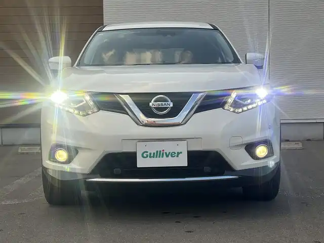 日産 エクストレイル 20X エマージェンシーブレーキ 秋田県 2015(平27)年 10.4万km ブリリアントホワイトパール ４WD/インテリジェントエマージェンシーブレーキ/純正SDナビ（DVD/CD/BT/AM/FM/USB）/フルセグ（走行中視聴不可能）/アラウンドビューモニター/社外１７インチアルミ（夏タイヤ装着）/スマートキー/純正エンジンスターター/アイドリングストップ/プッシュスタート/クルーズコントロール追従走行なし/ダウンヒルアシストコントロール/コーナーセンサー/車線逸脱防止支援システム/車両接近通報装置/ブラインドスポットモニター/ステアリングスイッチ/前席シートヒーター/ビルトインETC/センターデフロック/デジタルインナーミラー/社外フロアマット/純正ドアバイザー/オートライト/オートエアコン/パワーステアリング/パワーウィンドウ/横滑り防止/盗難防止装置/寒冷地仕様/電動格納ウィンカーミラー/取扱説明書/スペアキー×１