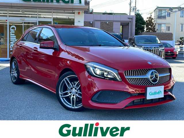 メルセデス・ベンツ Ａ１８０ AMG スタイル 大阪府 2015(平27)年 2.6万km ジュピターレッド 純正ナビ【TV/BlueTooth/CD・DVD】/バックカメラ/メモリー機能付パワーシート【運転席】/クルーズコントロール/アイドリングストップ/前席シートヒーター/アダプティブハイビームアシスト/パークトロニック/LEDヘッドランプ/前後ドライブレコーダー/18インチ5本スポークアルミホイール/パドルシフト/DYNAMICSELECT