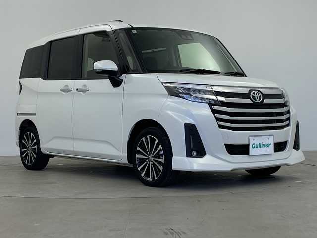 トヨタ ルーミー カスタムG－T 鹿児島県 2021(令3)年 1.4万km パールホワイトⅢ 社外ナビ/（CD・DVD/BT/フルセグ）/両側パワスラ/コーナーセンサー/ACC/オートブレーキホールド/バックカメラ/電動パーキング/コーナーセンサー/リアサンシェード/オートライト/スマートキー/プッシュスタート