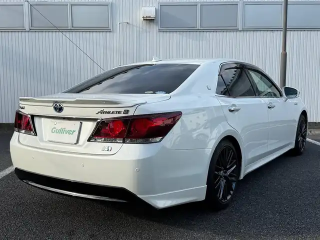 トヨタ クラウン ハイブリッド アスリートS ブラックスタイル 静岡県 2015(平27)年 3.8万km ホワイトパールクリスタルシャイン 走行37268キロ（登録時）/検査R8年1月15日まで/サンルーフ/テラロッサ（ダークレッド）革シート/純正HDDメーカーナビナビ・フルセグTV/パノラミックビューカメラ/ビルトインETC/ドライブレコーダー/クリアランスソナー/バックソナー/前席パワーシート/前席シートヒーター　/前席エアーシート/レーダークルーズコントロール/クリアランスソナー前後/電動リヤサンシェード/トランクスポイラー/トランクフードイージークローザー/純正18インチアルミホイール/LEDフォグランプ/スマートキー×2/プッシュスタート/純正フロアマット/純正ドアバイザー/カーテンエアB/車両取説＋ナビ取説/新車時保証書