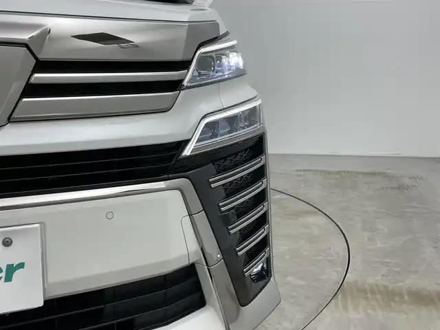 トヨタ ヴェルファイア Z Gエディション 岡山県 2019(平31)年 5.5万km ホワイトパールクリスタルシャイン アルパイン11インチナビ/【Bluetooth/フルセグTV/CD/DVD】/型番:EX112/サンルーフ/12.8インチフリップダウンモニター/型番:PXH12X-R-AV/１００Ｖ電源/両側パワースライドドア/レーダークルーズコントロール/ETC2.0/三眼LEDヘッドライト/衝突軽減ブレーキ/デジタルインナーミラー/ブラインドスポットモニター/前席シートヒーター/前席エアシート/ステアリングヒーター/前席パワーシート/シートメモリー/オートブレーキホールド/社外ドライブレコーダー/型番:DVR-C02W/社外レーダー/型番:ZERO705V